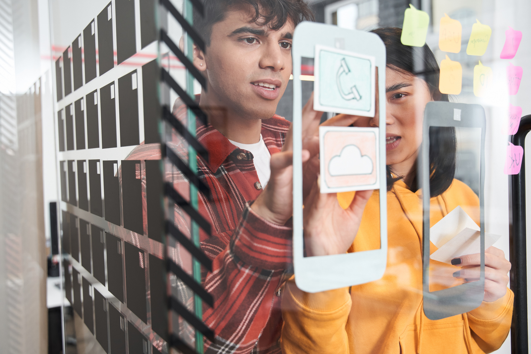 UX designers creating mobile app templates